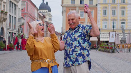 Smiling senior couple enjoying outdoors