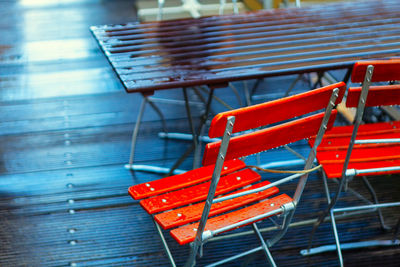 Outdoor terrace chairs and tables in raindrops . street terrace in rainy day . 