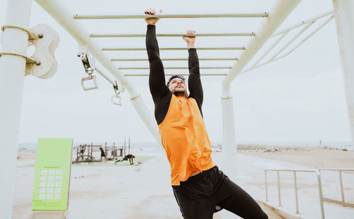 Athlete exercising at beach