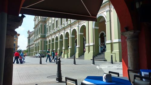 People in front of building