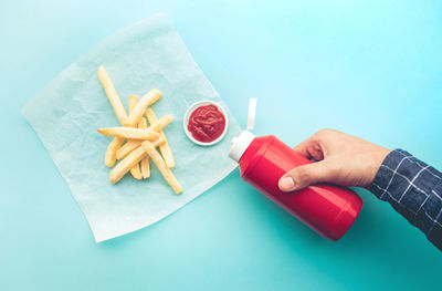 High angle view of hand holding food