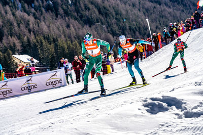 Group of people skiing on snow