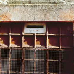 Close-up of mailbox on wall