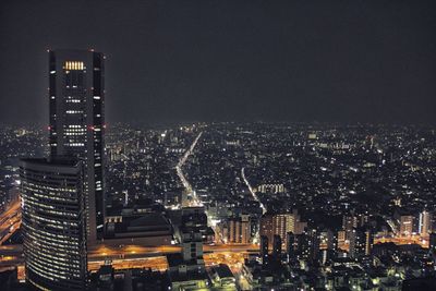 High angle view of illuminated cityscape at night
