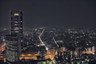 High angle view of illuminated cityscape at night