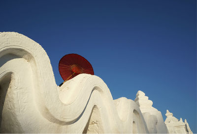 Low angle view of building against blue sky