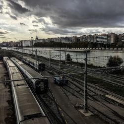 High angle view of train in city against sky