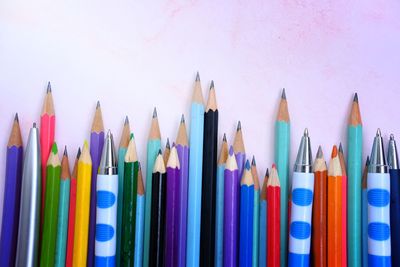 Close-up of colored pencils on table