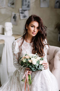 Beautiful woman with red flower