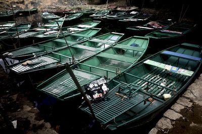 High angle view of fishing boats moored in lake