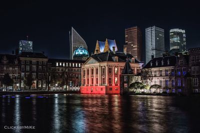 View of illuminated city at waterfront