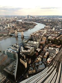 High angle view of river amidst buildings in city