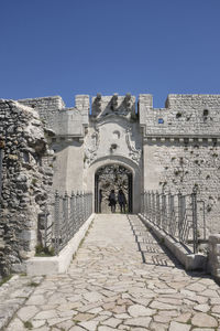 View of historical building against clear blue sky