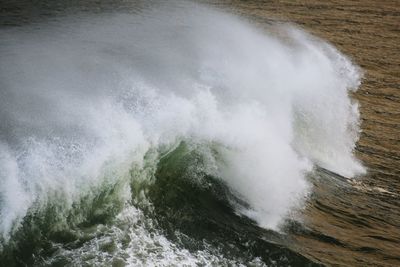 Waves splashing on rocks