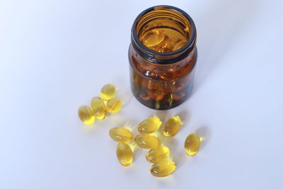 High angle view of drink in glass jar on white background
