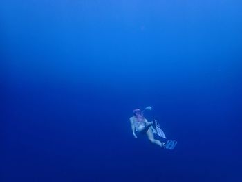 Person swimming in sea