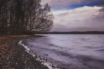 Scenic view of sea against cloudy sky