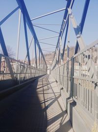 Bridge against sky in city