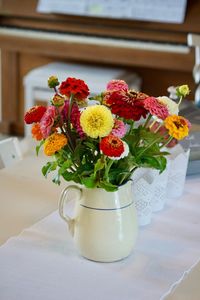 Close-up of flower vase on table