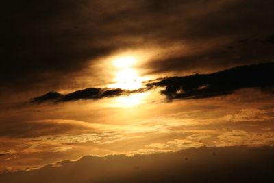 Low angle view of dramatic sky during sunset