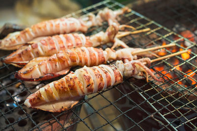 Close-up of meat on barbecue grill