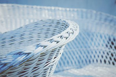 Cropped image of white rattan chair