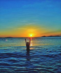 Scenic view of sea at sunset