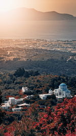 High angle view of townscape against sky during sunset