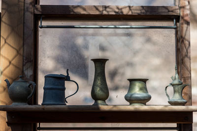 Close-up of old electric lamp on table