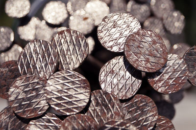 Close-up of nails in glass jar on table