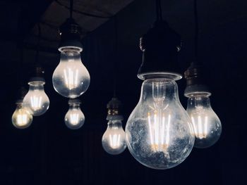 Close-up of illuminated light bulb