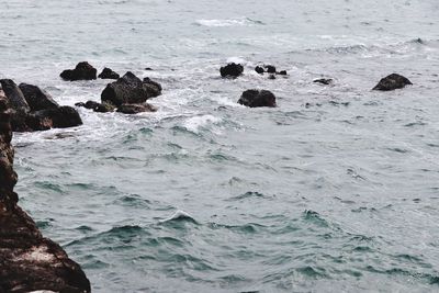 Scenic view of rocks in sea