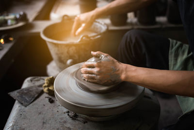 Midsection of potter making craft product