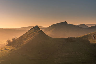 Scenic view of mountains against sky during sunset