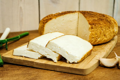 Close-up of bread on cutting board