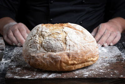 Close-up of man preparing food