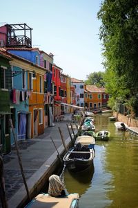 Boats moored at waterfront