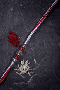 High angle view of red berries on the road