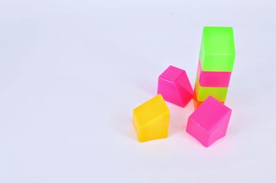 Close-up of colorful toy blocks against white background