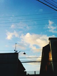 Low angle view of building against blue sky