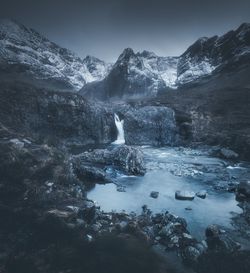 Scenic view of frozen lake against sky