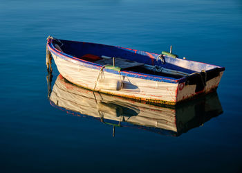 High angle view of boat moored in lake