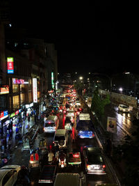 High angle view of traffic on city street at night