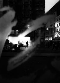 Cars on street in city at night
