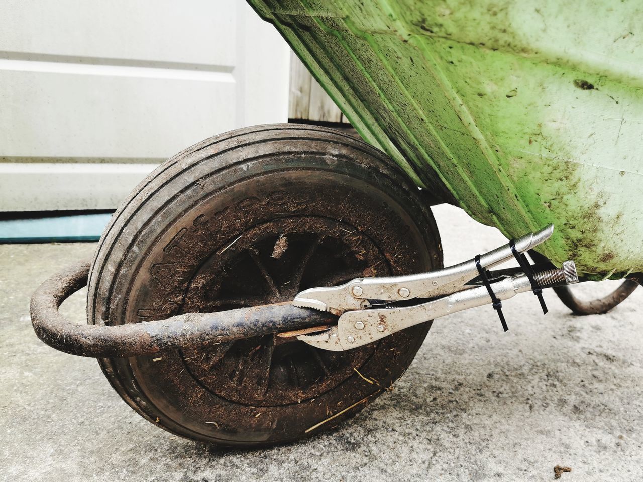 HIGH ANGLE VIEW OF TIRE IN CONTAINER