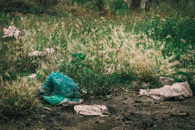 High angle view of garbage on field