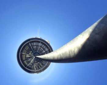 Low angle view of tower against clear blue sky