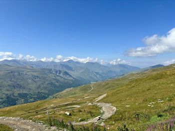 Scenic view of mountains against clear blue sky