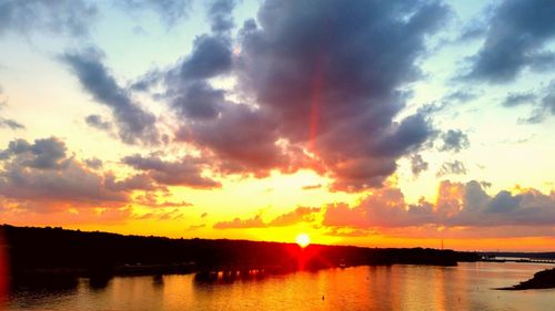 Scenic view of sunset over river