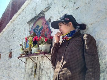 Portrait of man with flowers